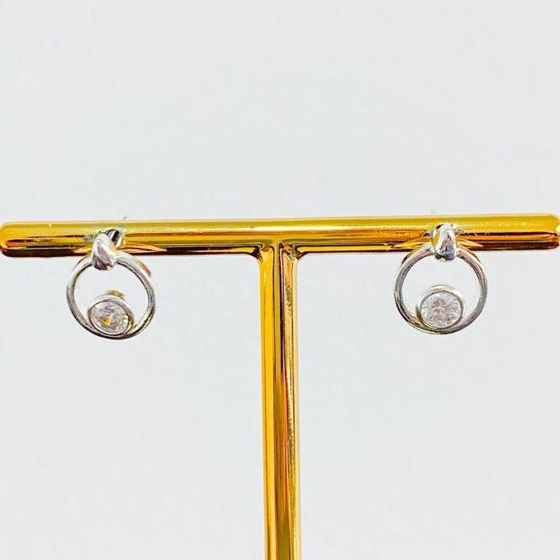 BRINCO REDONDO VAZADO COM ZIRCONIA
