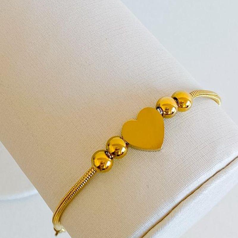 PULSEIRA CORAÇÃO COM BOLINHAS STEEL