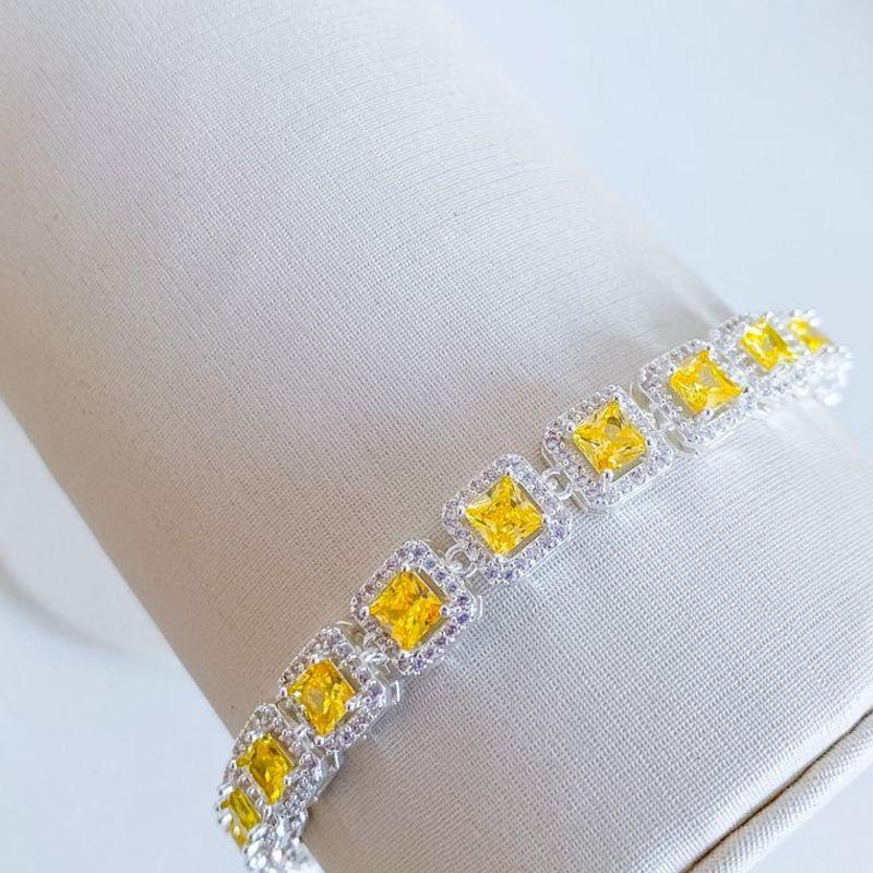 PULSEIRA RIVIERA CRAVEJADA AMARELA